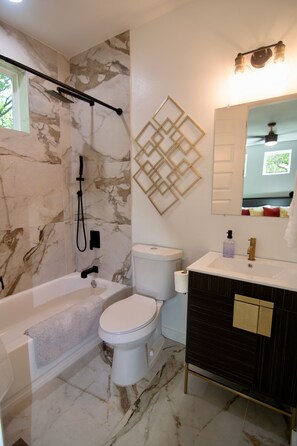 Shower, hair dryer, towels, soap