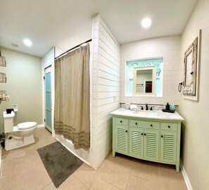 Shower, hair dryer, towels, soap