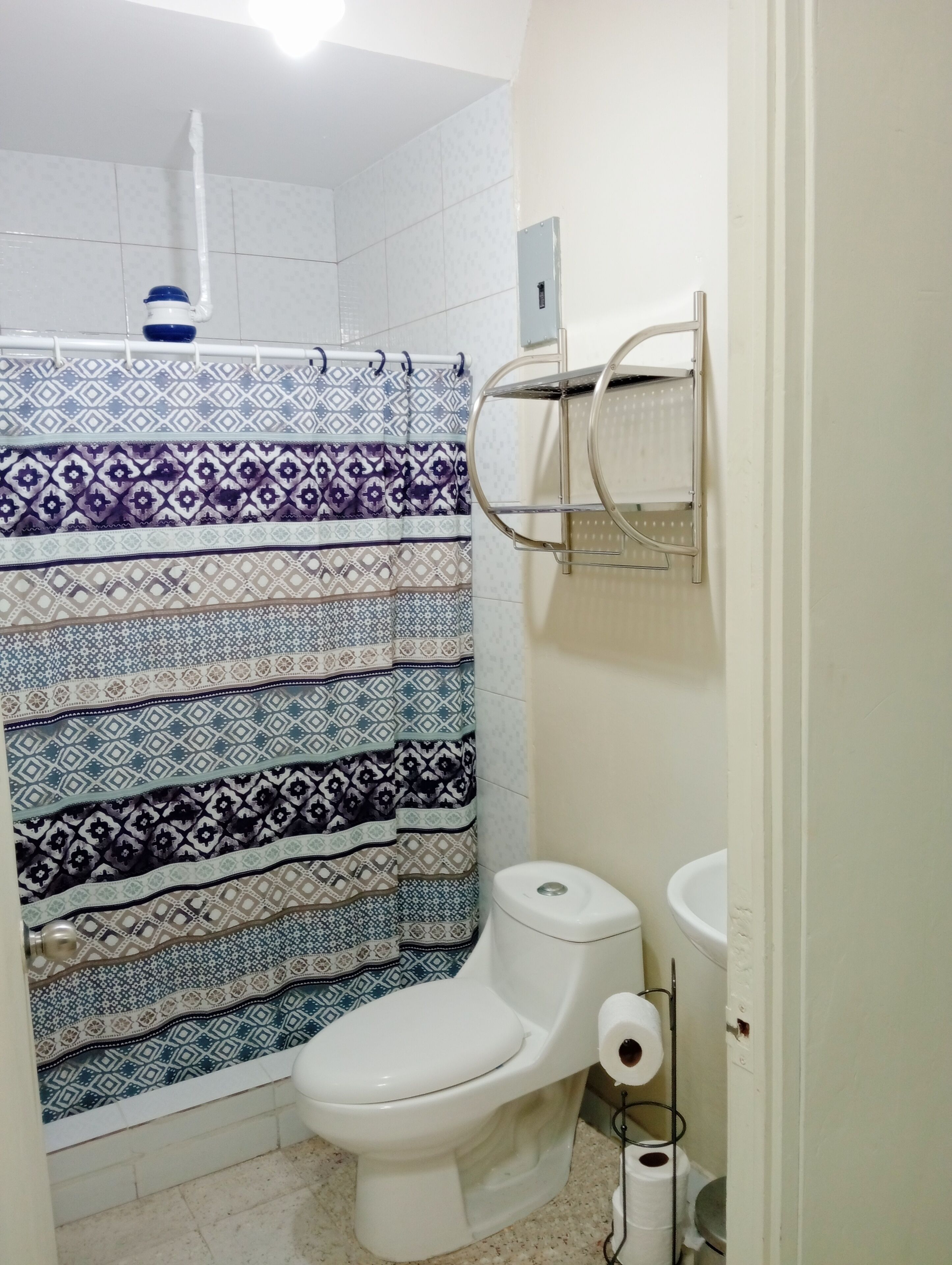 Shower, towels, soap, toilet paper