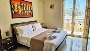 2 bedrooms, desk, iron/ironing board, travel crib