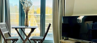 Stylish loft apartment in the center, facing the park.