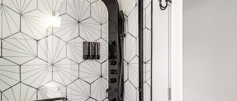 Shower, hair dryer, towels, soap