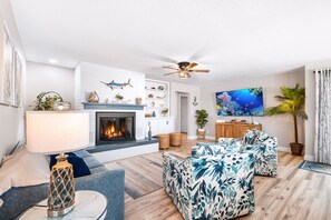 Smart TV, fireplace, books, music library