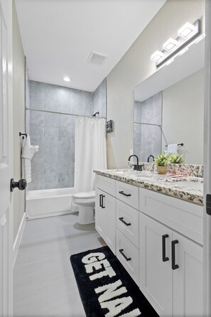 Hair dryer, towels, soap, shampoo