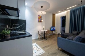 Apartment, 1 Bedroom, Smoking, Balcony | Living room