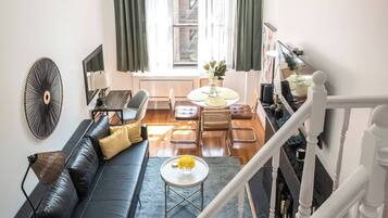 Apartment, 1 Bedroom, Garden View | Living room | Books