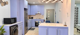2-bedroom apt in St George's with AC, WiFi, parking, near city, beach, stadium