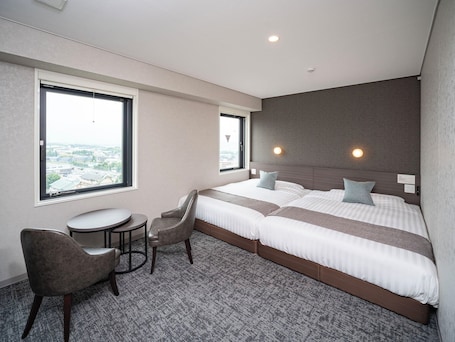 Twin Room, Non Smoking (Hollywood) | Desk, blackout drapes, soundproofing, free WiFi. Super Hotel Premier Aso Kumamoto Airport