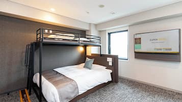 A bunk bed room with a bed, a window, and a wall-mounted screen displaying 'SuperHotel'.