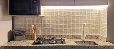 Fridge, microwave, stovetop, coffee/tea maker