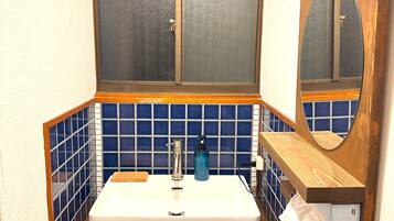Hair dryer, bidet, towels, soap