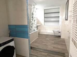 Hair dryer, towels, soap, toilet paper