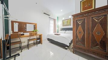 Habitación Deluxe | Escritorio, wifi gratis y ropa de cama