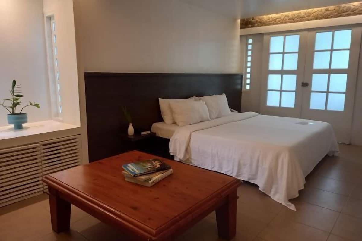 Blackout drapes, iron/ironing board (on request), WiFi (free)