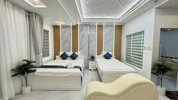 Kamar Triple Eksekutif | Minibar, meja kerja, Wi-Fi gratis, dan seprai linen
