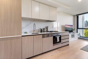 Fridge, microwave, oven, stovetop - City Views & Inner-North Cool at Your Door (North Melbourne)