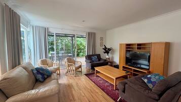 Comfort House, Multiple Beds, Non Smoking | Living area | 55-inch flat-screen TV with digital channels