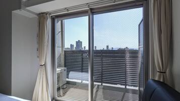Exclusive Quadruple Room, Lanai, City View | Balcony view