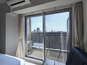 Chambre Quadruple Exclusive, véranda, vue ville | Vue depuis le balcon