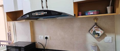 Fridge, microwave, electric kettle, cookware/dishes/utensils