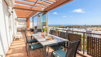 Family Penthouse, Multiple Bedrooms, 2 Bathrooms (Luxury la Cala Penthouse walking To) | Outdoor dining