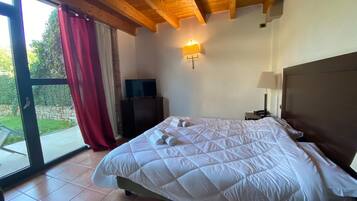 Camera Tripla con giardino | Safe på rommet, lydisolert, strykejern/-brett og wi-fi (inkludert)