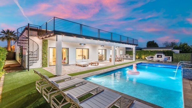 A modern house with a swimming pool, outdoor seating, and a spiral staircase. - NEW The Casa Privada Experience (Scottsdale)