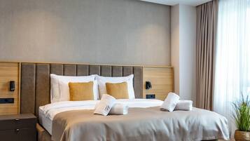 Deluxe kamer, 1 twee- of 2 eenpersoonsbedden, uitzicht op de stad | Lakens van Egyptisch katoen, luxe beddengoed