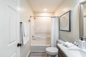 Hair dryer, towels, soap, shampoo
