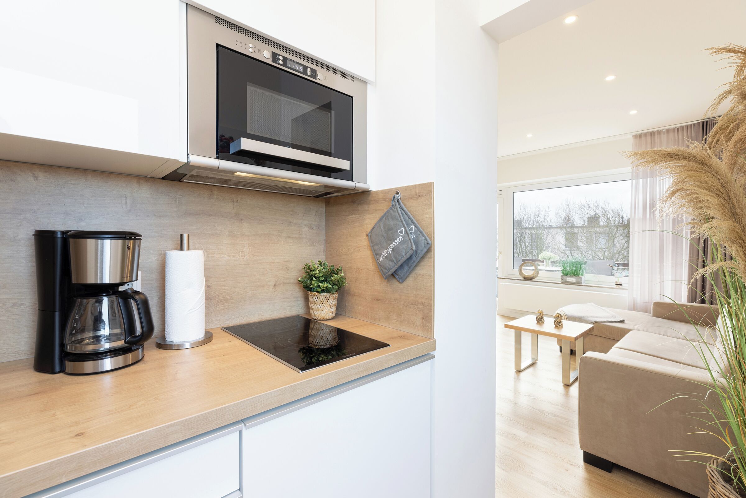 Fridge, microwave, stovetop, coffee/tea maker