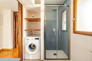 Hair dryer, bidet, towels, soap