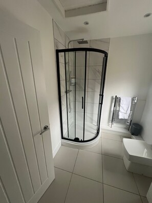 Shower, towels, soap, shampoo