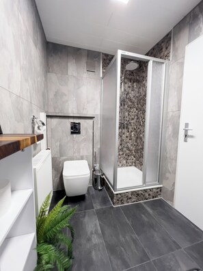 Hair dryer, towels, soap, shampoo