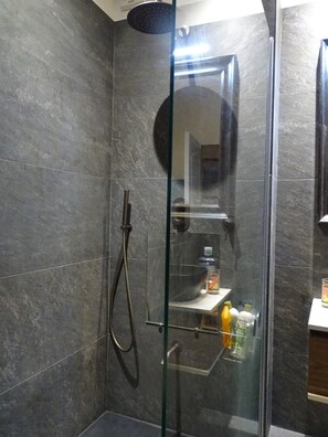 Shower, hair dryer, towels, soap