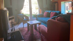 Cottage | Living area | TV, fireplace