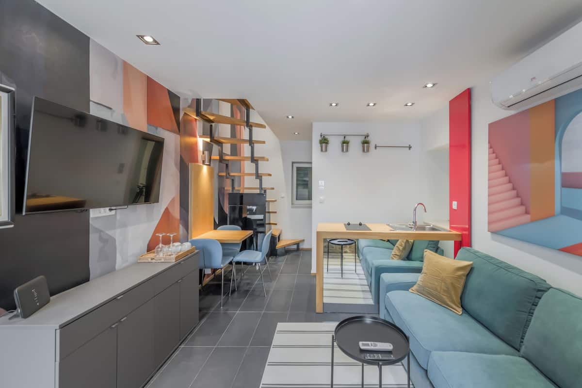 Apartment, 2 Bedrooms | Living area | 100-cm flat-screen TV with cable channels