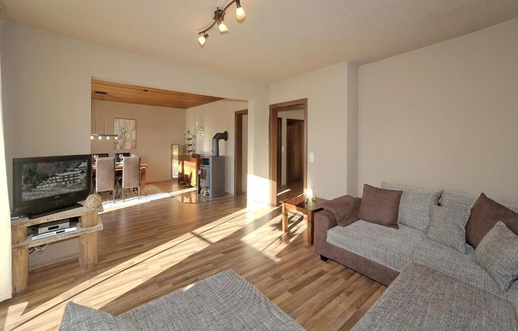 Family Suite, Kitchen, Mountain View | Living area | 40-cm TV with cable channels