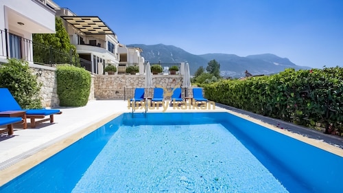 Located on Kalkan's Kalamar road, with a capacity of six people.