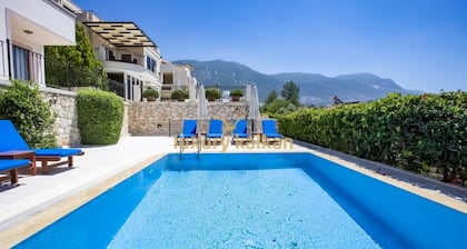 Located on Kalkan's Kalamar road, with a capacity of six people.