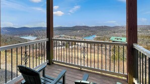 A wooden deck with a railing overlooking a river and hills. - L-3 Stunning Views clean cozy close to SDC (Branson)