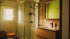 Shower, towels, soap, toilet paper