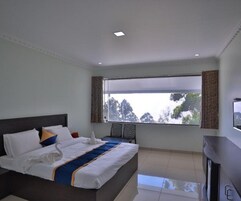 Deluxe Double Room, Balcony, Resort View | Desk, laptop workspace, iron/ironing board, free WiFi