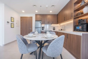 Fridge, microwave, stovetop, toaster - Free housekeeping visits during your stay - StayShort - Elegant 2BR Residence in the New The Diplomat (Townsquare)