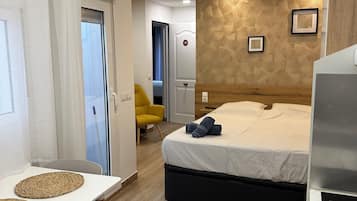 1 dormitorio, tabla de planchar con plancha, cuna de viaje y wifi gratis