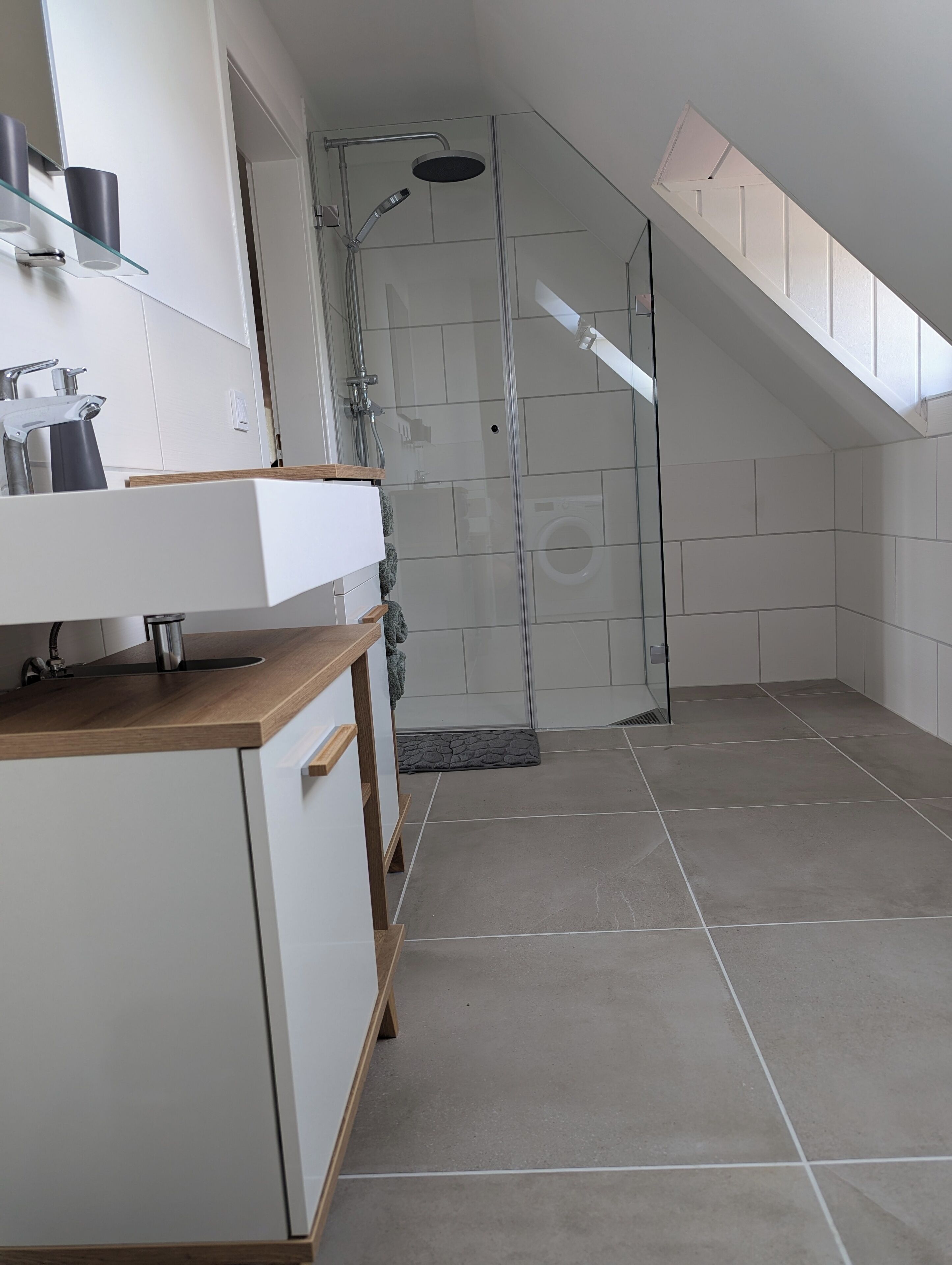Shower, hair dryer, towels, toilet paper