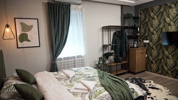 Laptop workspace, blackout curtains, soundproofing, iron/ironing board