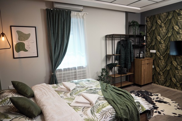 Laptop workspace, blackout drapes, soundproofing, iron/ironing board