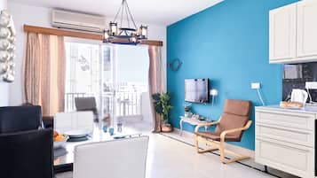 Family Apartment, Multiple Bedrooms (Exiles Bay - Camenzuli Apt 7) | Living area | 21-inch flat-screen TV with digital channels