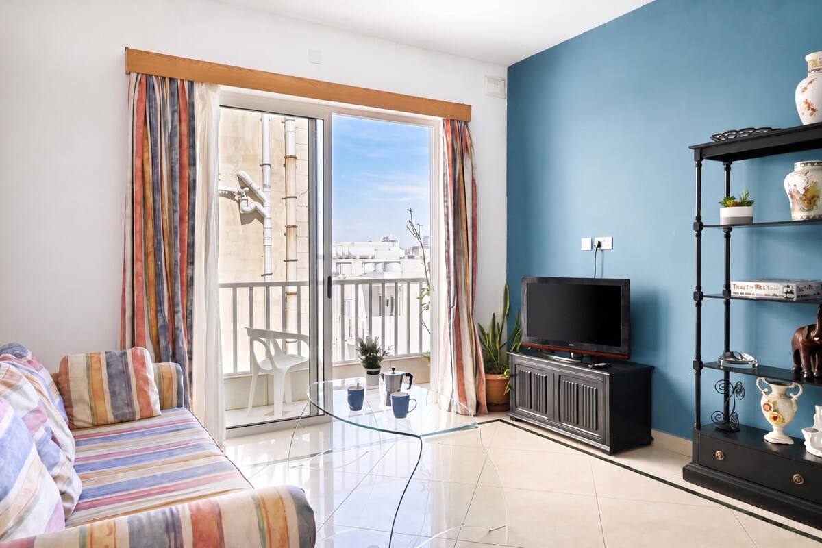 Family Apartment, 2 Bedrooms, Balcony (Exiles Bay - Camenzuli Apt 5) | Living area | Flat-screen TV