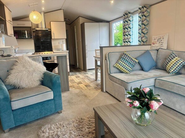 Cabin | Living area | Fireplace - Caravan in Holcot - Sleeps 6 - Pet Friendly (Northampton)